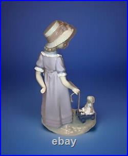 Lladro Girl With Toy Wagon 5044