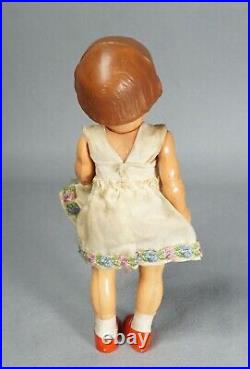Vintage German ARI 1015 Celluloid Doll Girl Toy withEmbroidered Dress